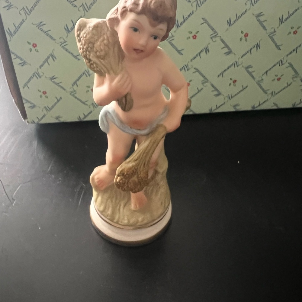 Charming Figurine with Wheat Sheaves